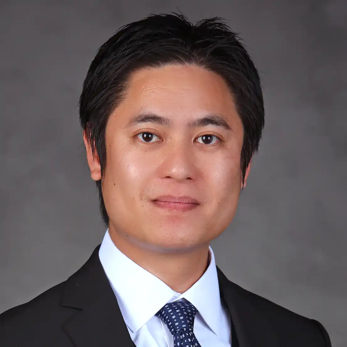 Headshot of Justin Le
