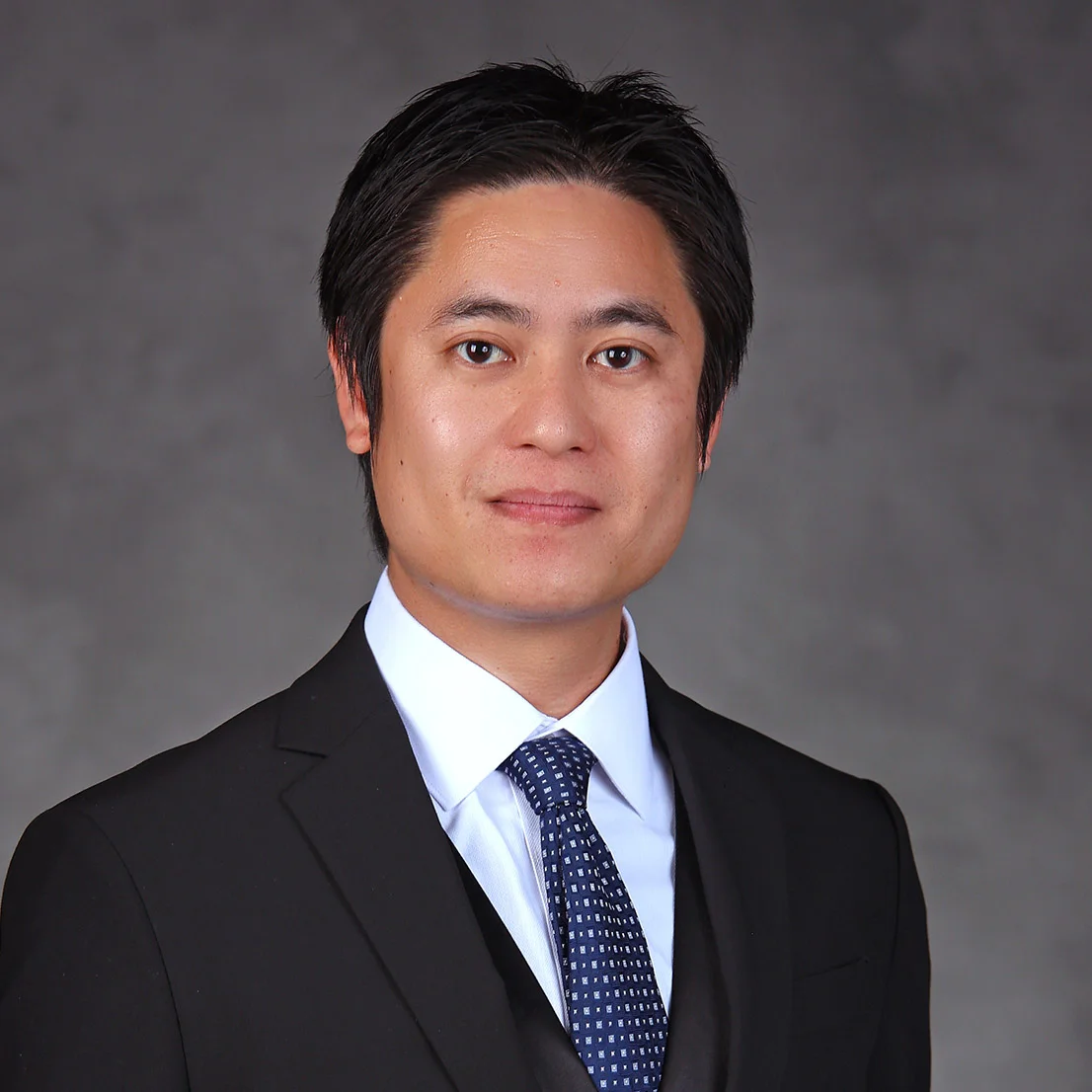 Headshot of Justin Le