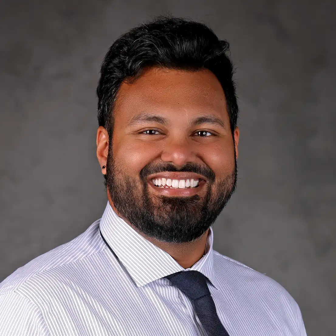 Headshot of Duval Samwaru