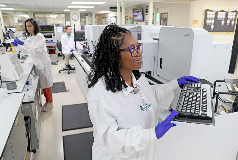 Lexington Health employees work in a medical lab.