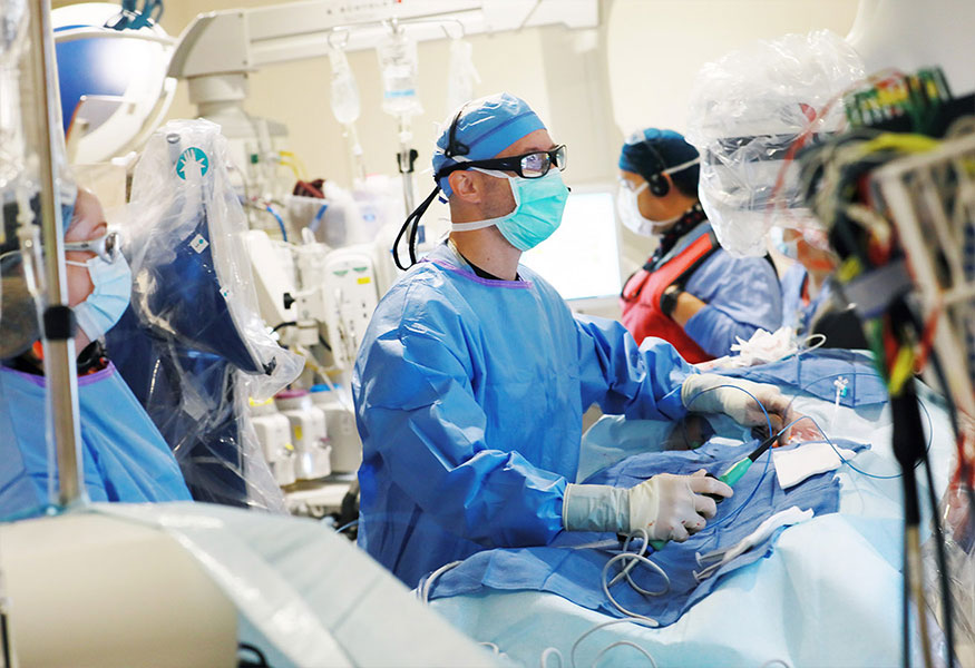 A team of surgeons performing surgery on a patient.